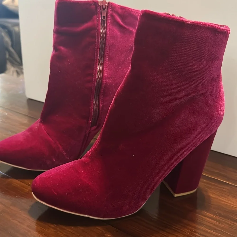 New but tried on Velvet Pink Ankle Boots. Size 9.5. Zip on side. Heel 4”.